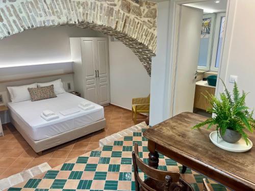 Postel nebo postele na pokoji v ubytování Corcyra Collection