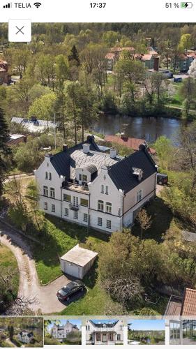 an aerial view of a large white house at Rosa Villan Högsby in Högsby