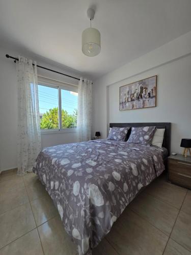 Ένα ή περισσότερα κρεβάτια σε δωμάτιο στο Ithaki Garden Cozy 1BR Apartment Universal