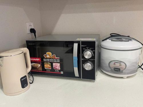 Dapur atau dapur kecil di HOMESTAY ADORA