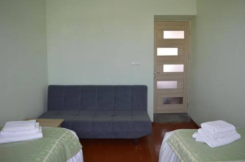Nikolyans' Guesthouseにあるベッド
