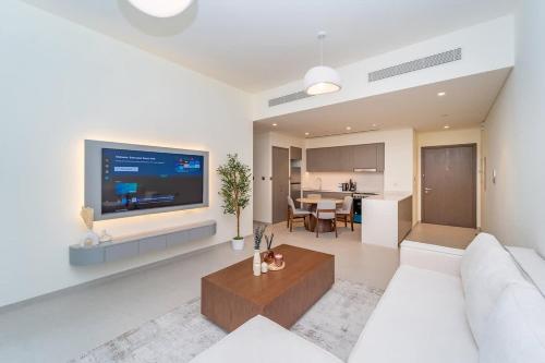 Μια τηλεόραση ή/και κέντρο ψυχαγωγίας στο New 1BR Burj view- Infinity Pool - Dubai Mall