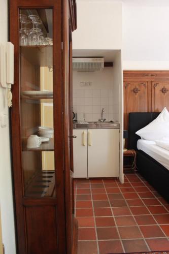 an open door to a kitchen with a sink at Rittergut Haus Laer in Bochum
