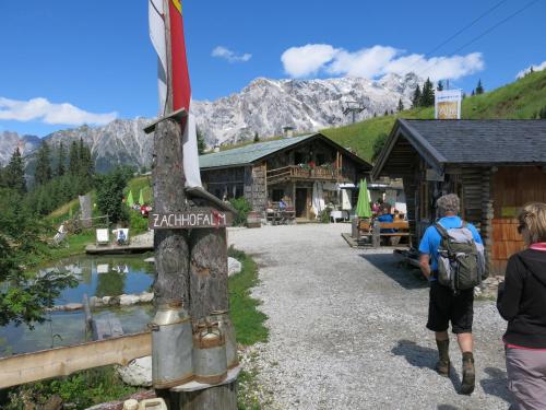 a group of people standing in front of a building at Ferienwohnung Simonhof in Maria Alm am Steinernen Meer