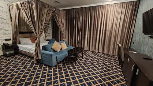 Кровать или кровати в номере Cornerche Center Baku