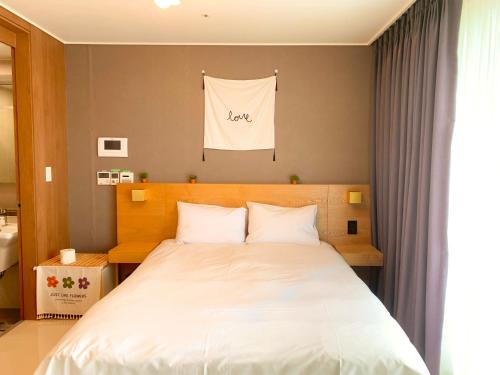 Cama o camas de una habitación en Blue Terra Sokcho