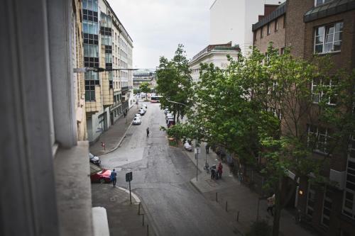 a view of a street in a city with buildings at City Hotel - HEEFA OHG in Hamburg