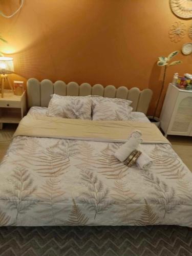 Ένα ή περισσότερα κρεβάτια σε δωμάτιο στο Kozee Boho Retreat