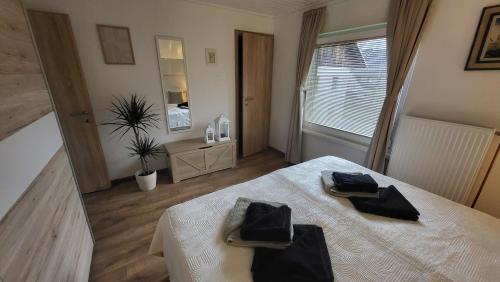 Postel nebo postele na pokoji v ubytování Apartma Leila