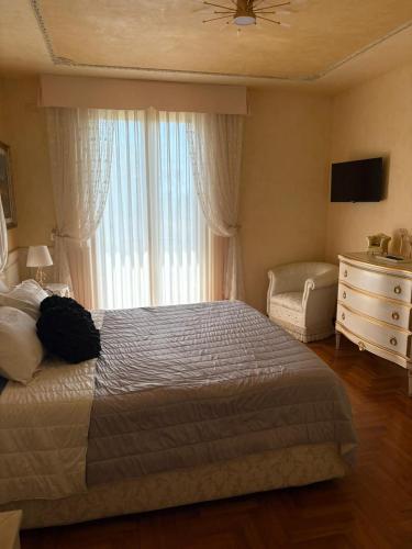 Ένα ή περισσότερα κρεβάτια σε δωμάτιο στο Guest House Fiore di Loto