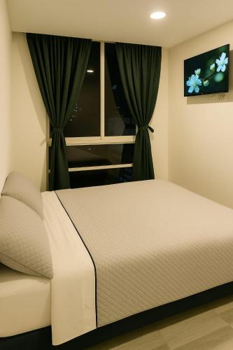 Ένα ή περισσότερα κρεβάτια σε δωμάτιο στο Loft Moderno en Zona Céntrica Torre Colpatria Museo Nacional