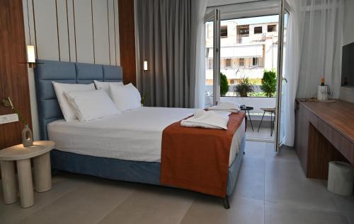 Katil atau katil-katil dalam bilik di Restia Luxury Loft