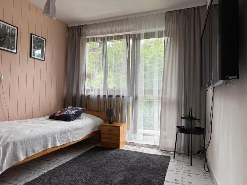 Postel nebo postele na pokoji v ubytování Dom Ochotnica