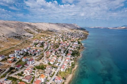 an aerial view of a small island in the water at Babic Apartments in Pag