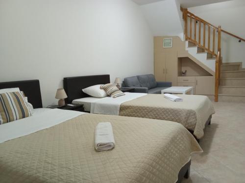 Ένα ή περισσότερα κρεβάτια σε δωμάτιο στο Fantasia Villas Deluxe "Selene"