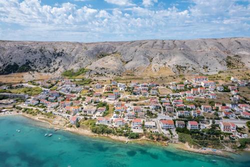 an aerial view of a small town on the beach at Babic Apartments in Pag