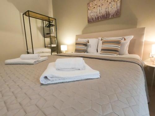 Ένα ή περισσότερα κρεβάτια σε δωμάτιο στο Sotirakis Apartment
