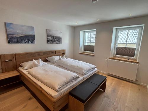 Postel nebo postele na pokoji v ubytování Fichtellofts