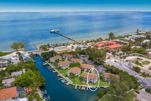 an aerial view of a resort on the water at Coconut Bayou home in Anna Maria