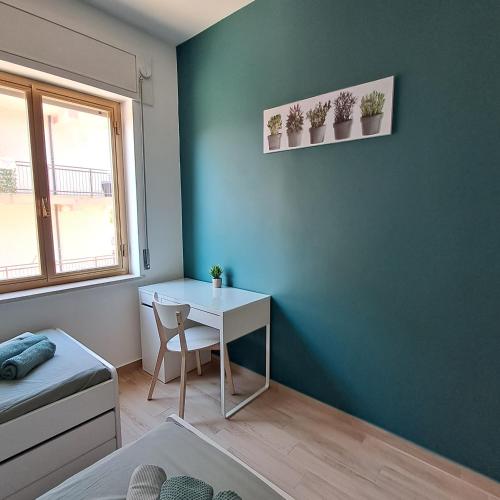 a small room with a table and a chair at Bella Italia in Marina di Strongoli