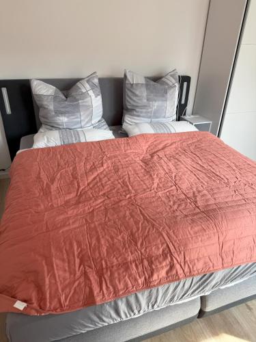 Postel nebo postele na pokoji v ubytování Quiet Stay Zepernick - direkt an Berlin