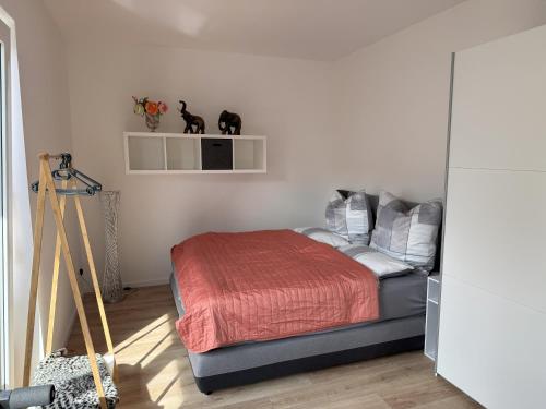 Postel nebo postele na pokoji v ubytování Quiet Stay Zepernick - direkt an Berlin