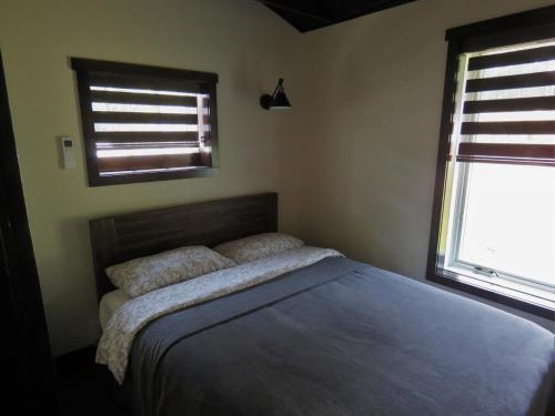Katil atau katil-katil dalam bilik di The River Cabin