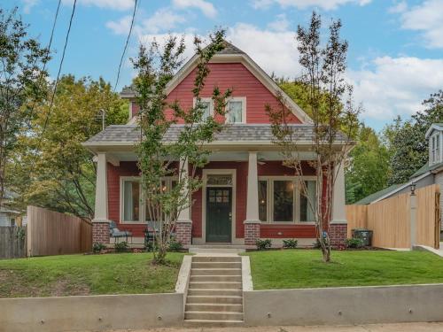 a home with a red house at Higbee House Too, AKA The Jolly Roger in Memphis