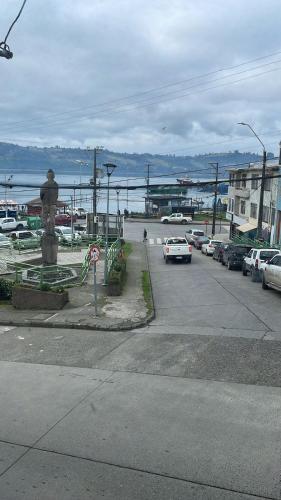a parking lot with cars parked in a parking lot at Puerta 21 in Castro
