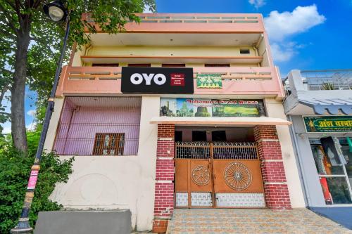 a building with an oro sign on the front of it at Hotel O Mahamaya Guest House in Varanasi