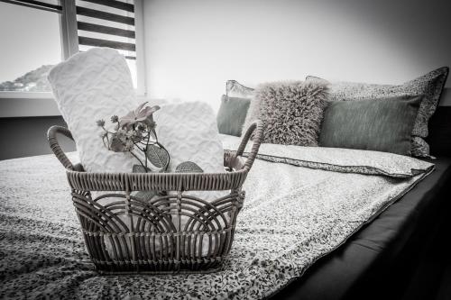 a basket sitting on top of a couch at Balkan Tower Deluxe Candy in Gabrovo