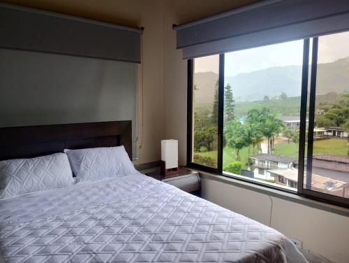 Katil atau katil-katil dalam bilik di Quimbaya Campestre Hotel