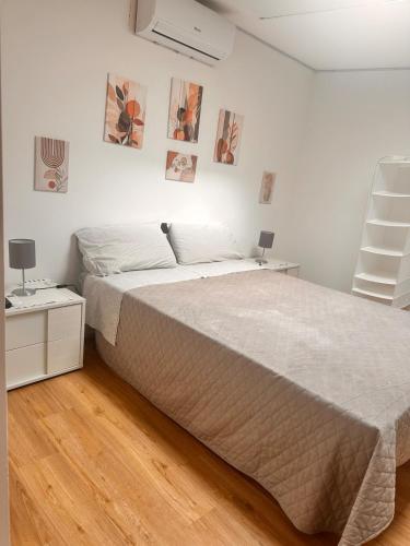 Ένα ή περισσότερα κρεβάτια σε δωμάτιο στο Marina's Cozy Nest