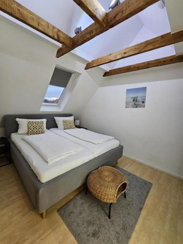 Postel nebo postele na pokoji v ubytování Ferienhaus Dünenweg