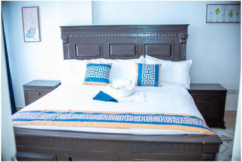Ένα ή περισσότερα κρεβάτια σε δωμάτιο στο Ruaka View Apartments- cozy 2 bedroom