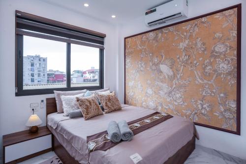 Voodi või voodid majutusasutuse The Little Hanoi - Indochine home - Super central toas