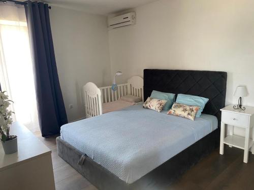 Postel nebo postele na pokoji v ubytování Apartmani Sollei