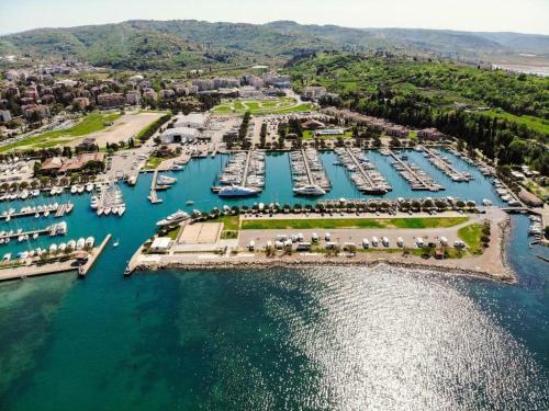 an aerial view of a marina with boats at Luxury Houseboat Lavender in Portorož