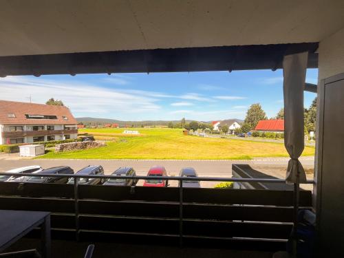 a view of a field from a church window at Apartment Mary Mehlmeisel in Mehlmeisel