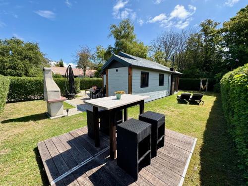 Zahrada ubytování Oosterschelde Lodge met veel privacy en dicht bij het water