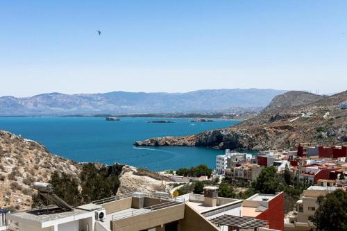a view of a city and a body of water at Luxury Apartment with Private Patio & City Charm in Al Hoceïma