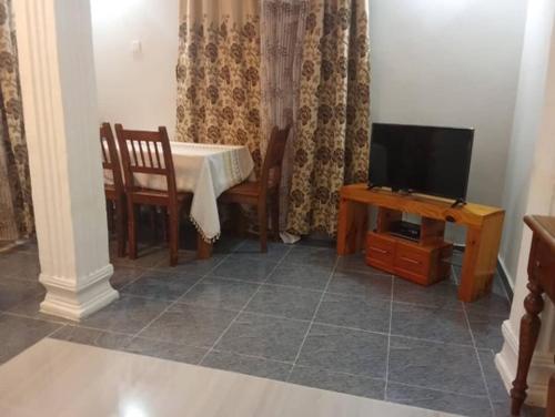 TV a/nebo společenská místnost v ubytování Nabixx Residence