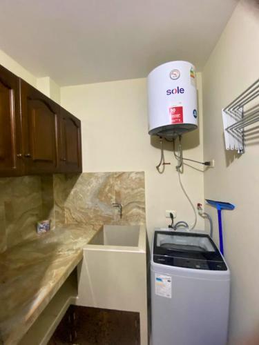 Dapur atau dapur kecil di Minidepa 701 en condominio exclusivo