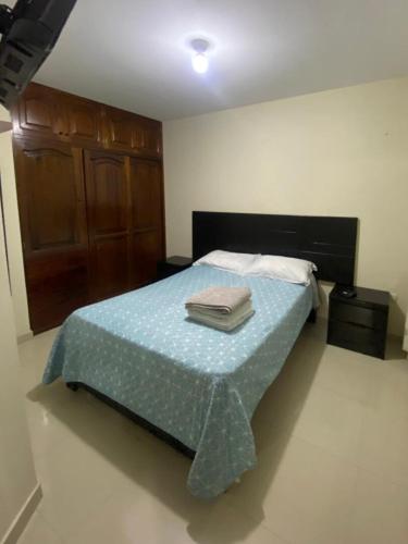 Katil atau katil-katil dalam bilik di Minidepa 701 en condominio exclusivo