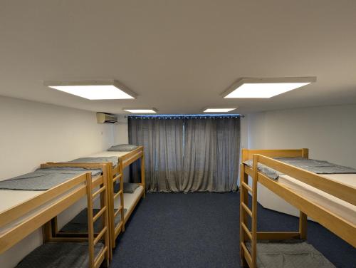 Ein Bett oder Betten in einem Zimmer der Unterkunft Hostel Rio