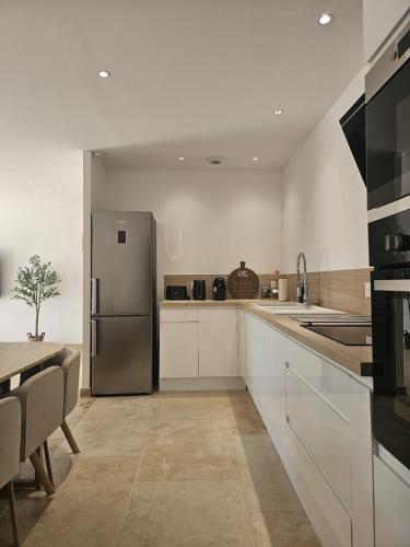 Dapur atau dapur kecil di Maison Palma - Séjour d'exception avec piscine privée