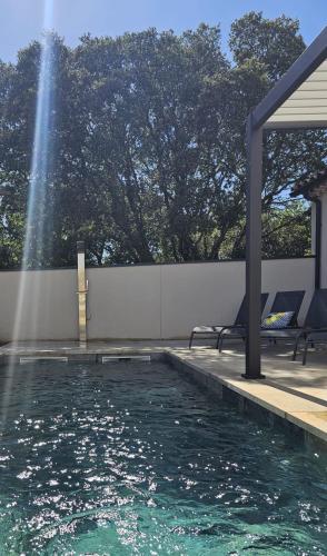 Kolam renang di atau dekat dengan Maison Palma - Séjour d'exception avec piscine privée