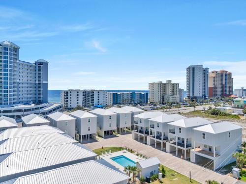 an aerial view of a city with buildings at The Hangout House Relaxed 4BR Luxury, 3 King Suites, Walk to Beach, Pet Friendly in Gulf Shores