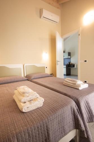 Postel nebo postele na pokoji v ubytování Casa del sole
