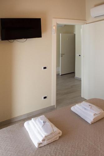Postel nebo postele na pokoji v ubytování Casa del sole